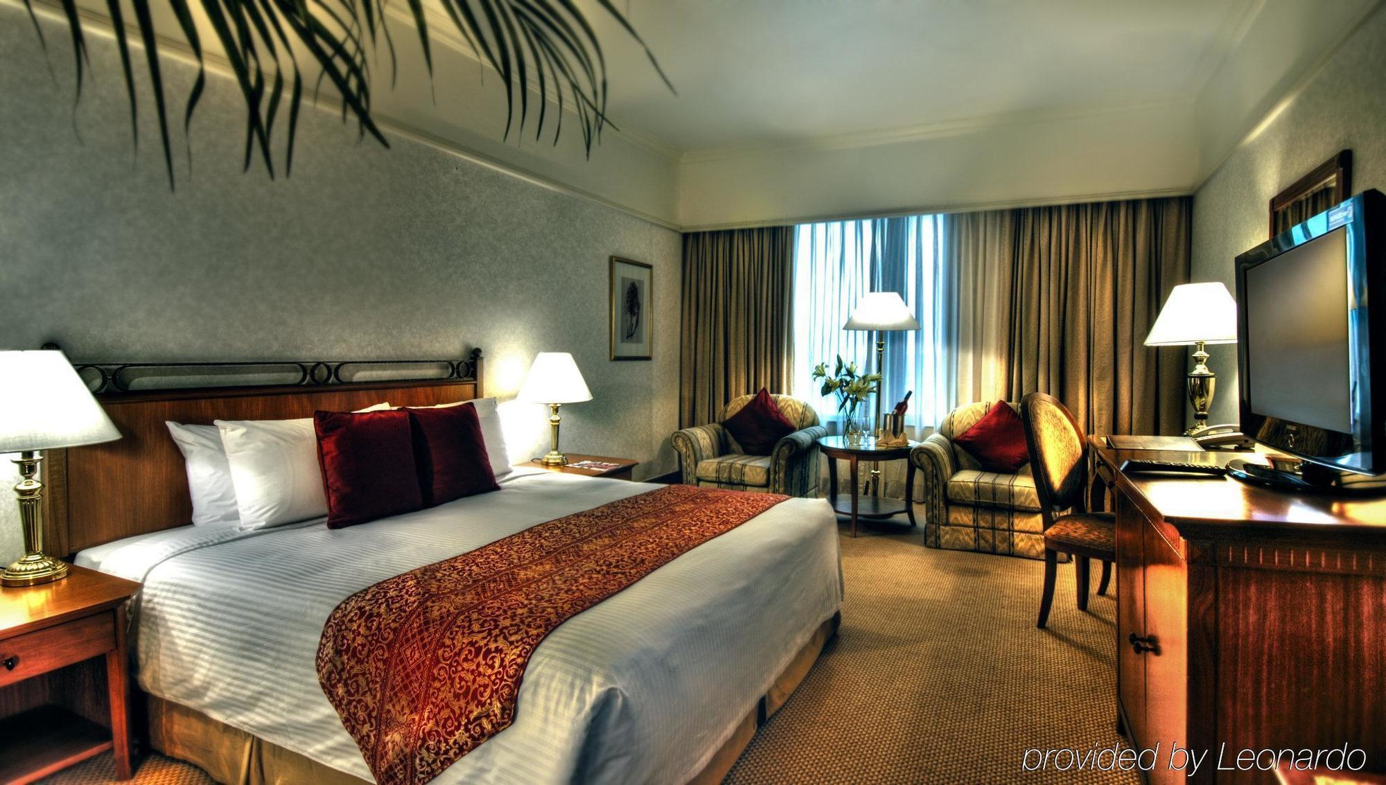 Отель Dorsett Куала-Лумпур Экстерьер фото A room at the hotel